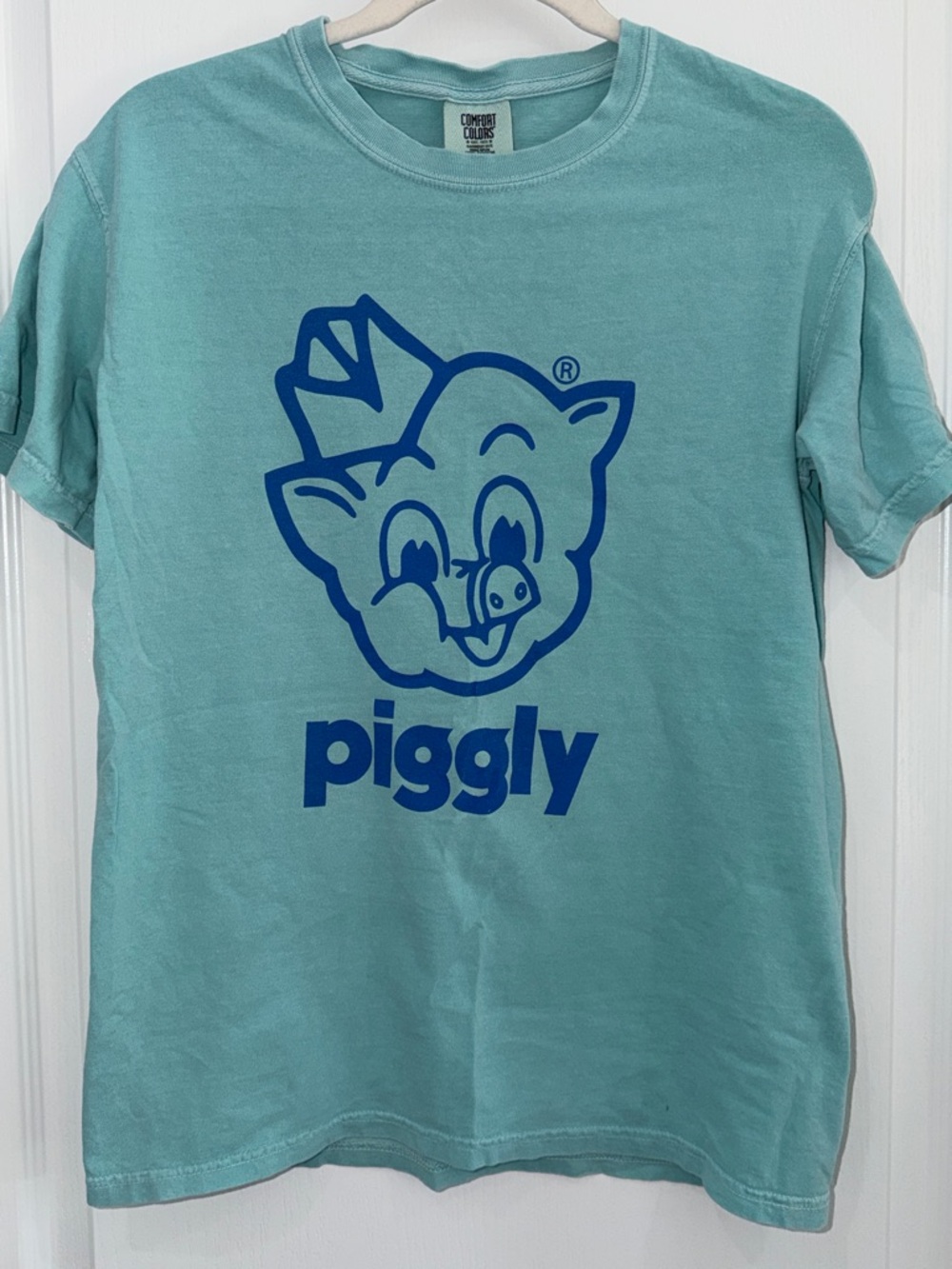Comfort Colors woman’s  Tee in Aqua with Blue Piggly wiggly Hilton head  Logo S